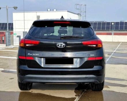 Черный Хендай Туксон, объемом двигателя 2 л и пробегом 76 тыс. км за 11200 $, фото 2 на Automoto.ua