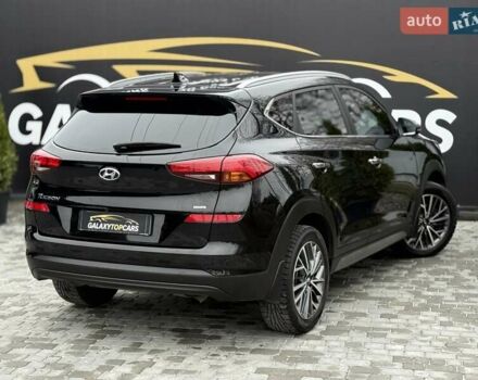 Черный Хендай Туксон, объемом двигателя 2 л и пробегом 55 тыс. км за 22300 $, фото 21 на Automoto.ua