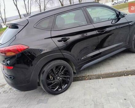 Черный Хендай Туксон, объемом двигателя 1.6 л и пробегом 183 тыс. км за 24300 $, фото 4 на Automoto.ua