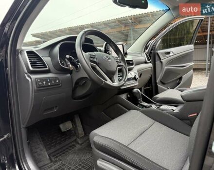 Черный Хендай Туксон, объемом двигателя 2 л и пробегом 55 тыс. км за 22300 $, фото 41 на Automoto.ua