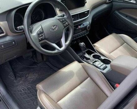 Черный Хендай Туксон, объемом двигателя 2 л и пробегом 129 тыс. км за 16500 $, фото 5 на Automoto.ua