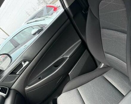 Черный Хендай Туксон, объемом двигателя 2 л и пробегом 55 тыс. км за 25000 $, фото 1 на Automoto.ua