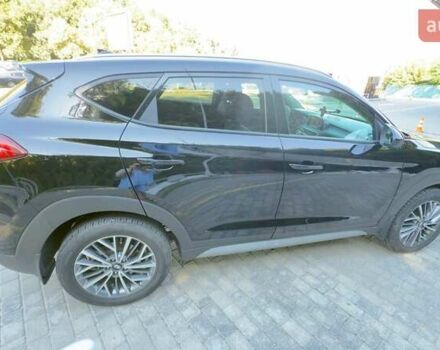 Черный Хендай Туксон, объемом двигателя 2.4 л и пробегом 69 тыс. км за 22000 $, фото 2 на Automoto.ua