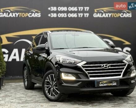 Черный Хендай Туксон, объемом двигателя 2 л и пробегом 55 тыс. км за 22300 $, фото 4 на Automoto.ua