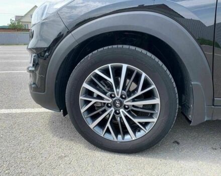 Черный Хендай Туксон, объемом двигателя 2 л и пробегом 129 тыс. км за 16500 $, фото 4 на Automoto.ua