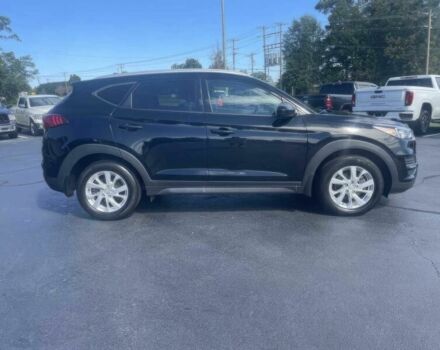 Черный Хендай Туксон, объемом двигателя 2 л и пробегом 38 тыс. км за 10400 $, фото 3 на Automoto.ua