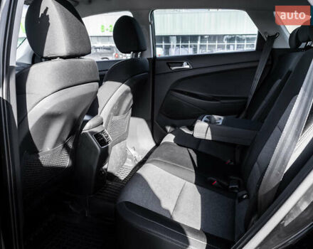 Черный Хендай Туксон, объемом двигателя 2 л и пробегом 88 тыс. км за 23000 $, фото 18 на Automoto.ua