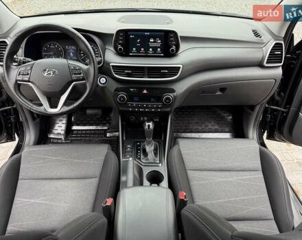Черный Хендай Туксон, объемом двигателя 2 л и пробегом 77 тыс. км за 21500 $, фото 34 на Automoto.ua