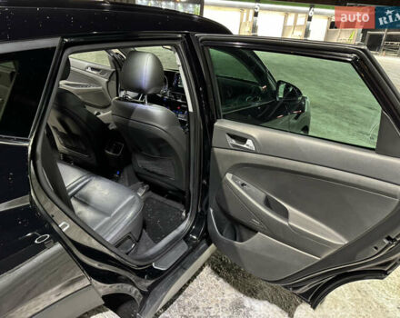 Черный Хендай Туксон, объемом двигателя 2 л и пробегом 86 тыс. км за 31000 $, фото 10 на Automoto.ua