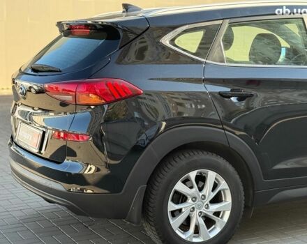 Черный Хендай Туксон, объемом двигателя 2 л и пробегом 54 тыс. км за 24490 $, фото 4 на Automoto.ua