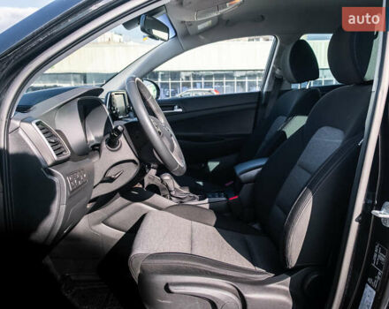 Черный Хендай Туксон, объемом двигателя 2 л и пробегом 88 тыс. км за 23000 $, фото 17 на Automoto.ua