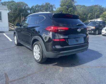 Черный Хендай Туксон, объемом двигателя 2 л и пробегом 38 тыс. км за 10400 $, фото 5 на Automoto.ua