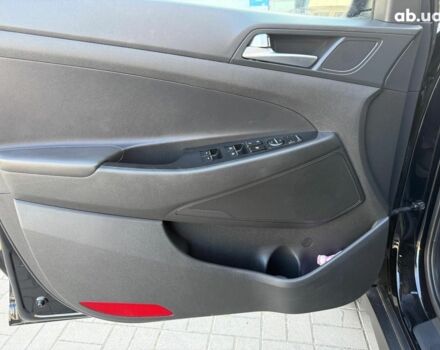 Черный Хендай Туксон, объемом двигателя 2 л и пробегом 54 тыс. км за 24490 $, фото 19 на Automoto.ua