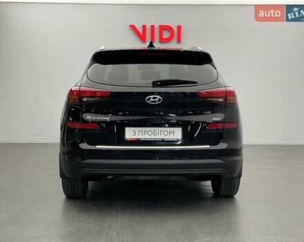 Черный Хендай Туксон, объемом двигателя 2 л и пробегом 100 тыс. км за 22424 $, фото 5 на Automoto.ua
