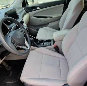 Черный Хендай Туксон, объемом двигателя 2 л и пробегом 76 тыс. км за 11200 $, фото 10 на Automoto.ua