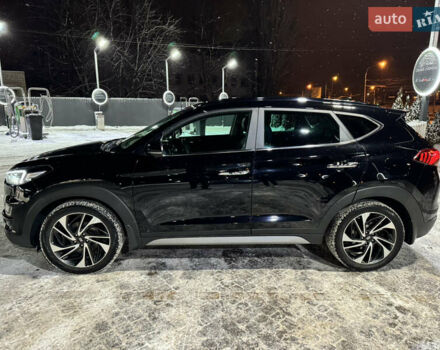 Черный Хендай Туксон, объемом двигателя 2 л и пробегом 86 тыс. км за 31000 $, фото 7 на Automoto.ua