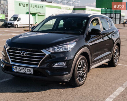 Черный Хендай Туксон, объемом двигателя 2 л и пробегом 88 тыс. км за 23000 $, фото 10 на Automoto.ua