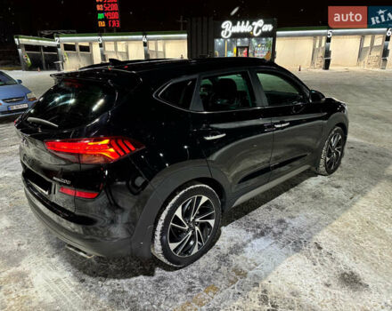 Черный Хендай Туксон, объемом двигателя 2 л и пробегом 86 тыс. км за 31000 $, фото 3 на Automoto.ua
