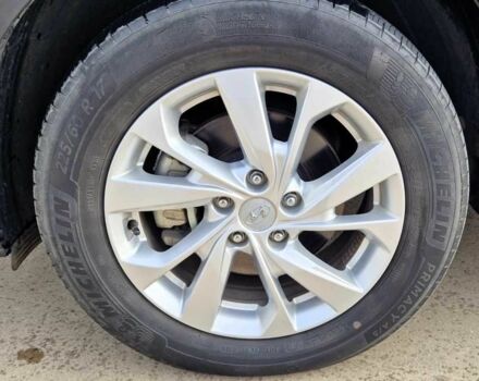 Черный Хендай Туксон, объемом двигателя 2 л и пробегом 76 тыс. км за 11200 $, фото 8 на Automoto.ua