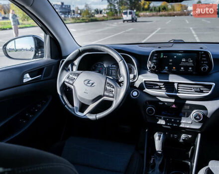 Черный Хендай Туксон, объемом двигателя 2 л и пробегом 88 тыс. км за 23000 $, фото 20 на Automoto.ua