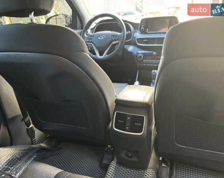 Черный Хендай Туксон, объемом двигателя 2 л и пробегом 74 тыс. км за 22600 $, фото 6 на Automoto.ua