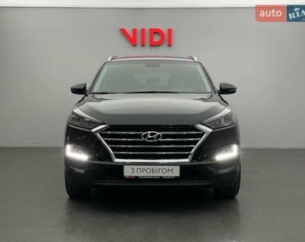 Черный Хендай Туксон, объемом двигателя 2 л и пробегом 100 тыс. км за 22424 $, фото 4 на Automoto.ua