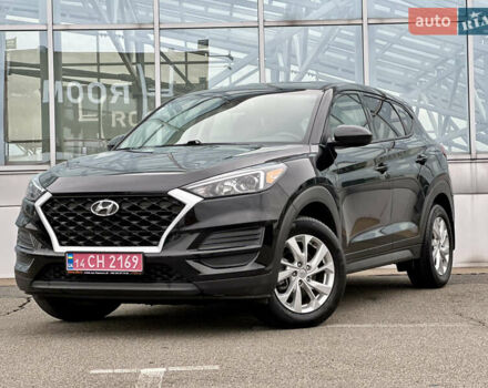 Черный Хендай Туксон, объемом двигателя 2 л и пробегом 48 тыс. км за 20490 $, фото 5 на Automoto.ua