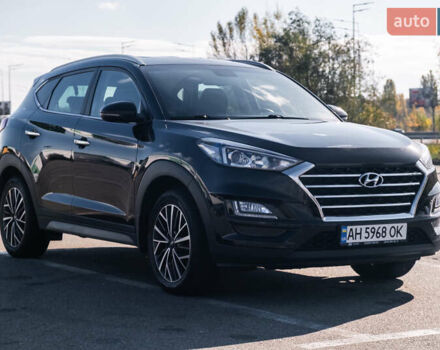 Черный Хендай Туксон, объемом двигателя 2 л и пробегом 88 тыс. км за 23000 $, фото 1 на Automoto.ua