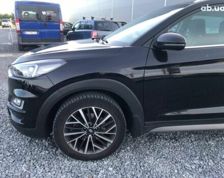 Черный Хендай Туксон, объемом двигателя 2 л и пробегом 87 тыс. км за 20790 $, фото 2 на Automoto.ua