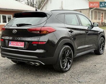 Черный Хендай Туксон, объемом двигателя 2 л и пробегом 98 тыс. км за 25900 $, фото 12 на Automoto.ua