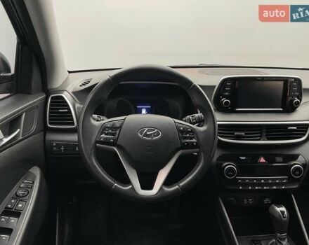 Черный Хендай Туксон, объемом двигателя 2 л и пробегом 100 тыс. км за 22424 $, фото 12 на Automoto.ua