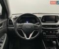 Черный Хендай Туксон, объемом двигателя 2 л и пробегом 100 тыс. км за 22424 $, фото 12 на Automoto.ua