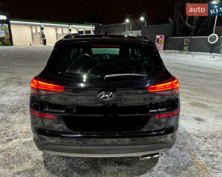 Черный Хендай Туксон, объемом двигателя 2 л и пробегом 86 тыс. км за 31000 $, фото 1 на Automoto.ua