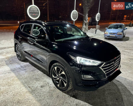 Черный Хендай Туксон, объемом двигателя 2 л и пробегом 86 тыс. км за 31000 $, фото 2 на Automoto.ua