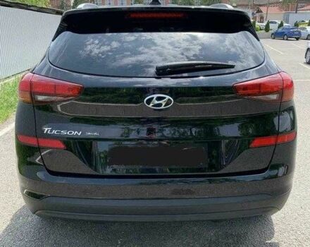 Черный Хендай Туксон, объемом двигателя 2 л и пробегом 129 тыс. км за 16500 $, фото 3 на Automoto.ua