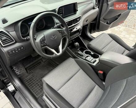 Черный Хендай Туксон, объемом двигателя 2 л и пробегом 55 тыс. км за 22300 $, фото 28 на Automoto.ua