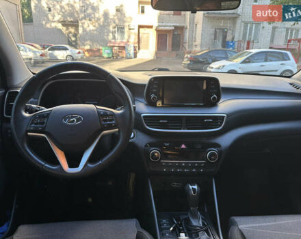 Черный Хендай Туксон, объемом двигателя 2 л и пробегом 74 тыс. км за 22600 $, фото 9 на Automoto.ua