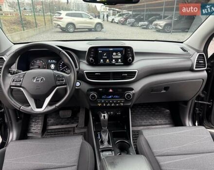 Черный Хендай Туксон, объемом двигателя 2 л и пробегом 55 тыс. км за 22300 $, фото 27 на Automoto.ua