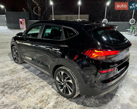 Черный Хендай Туксон, объемом двигателя 2 л и пробегом 86 тыс. км за 31000 $, фото 8 на Automoto.ua