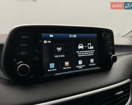 Черный Хендай Туксон, объемом двигателя 2 л и пробегом 100 тыс. км за 22424 $, фото 17 на Automoto.ua