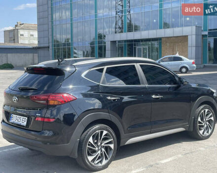 Чорний Хендай Туксон, об'ємом двигуна 2 л та пробігом 67 тис. км за 23700 $, фото 4 на Automoto.ua