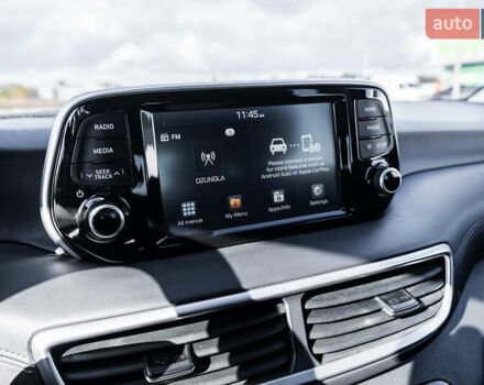 Черный Хендай Туксон, объемом двигателя 2 л и пробегом 88 тыс. км за 23000 $, фото 14 на Automoto.ua