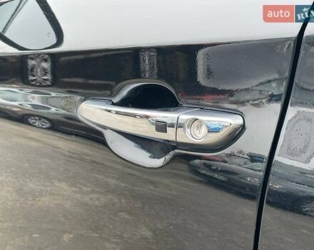 Черный Хендай Туксон, объемом двигателя 2.36 л и пробегом 137 тыс. км за 21990 $, фото 14 на Automoto.ua