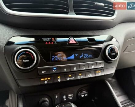 Черный Хендай Туксон, объемом двигателя 2 л и пробегом 55 тыс. км за 22300 $, фото 47 на Automoto.ua