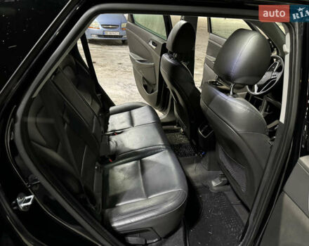 Черный Хендай Туксон, объемом двигателя 2 л и пробегом 86 тыс. км за 31000 $, фото 12 на Automoto.ua