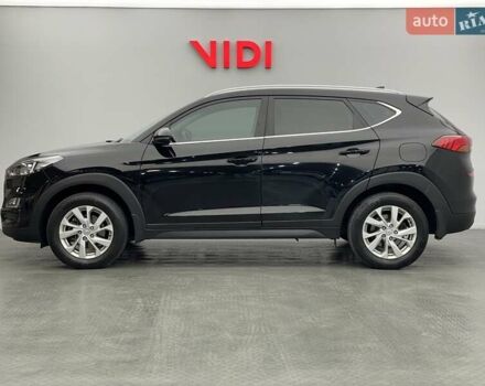 Черный Хендай Туксон, объемом двигателя 2 л и пробегом 100 тыс. км за 22424 $, фото 2 на Automoto.ua