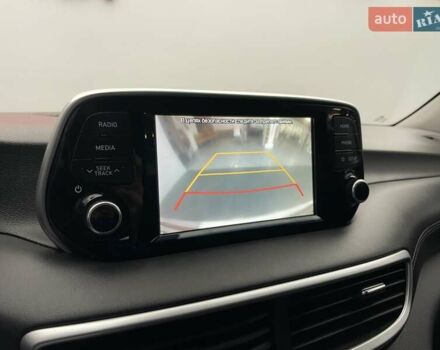 Черный Хендай Туксон, объемом двигателя 2 л и пробегом 100 тыс. км за 22424 $, фото 18 на Automoto.ua