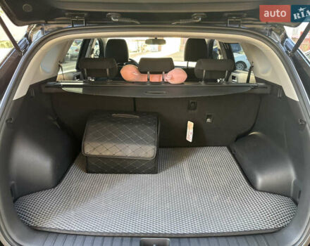 Черный Хендай Туксон, объемом двигателя 2 л и пробегом 74 тыс. км за 22600 $, фото 13 на Automoto.ua