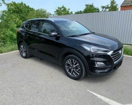 Черный Хендай Туксон, объемом двигателя 2 л и пробегом 129 тыс. км за 16500 $, фото 2 на Automoto.ua