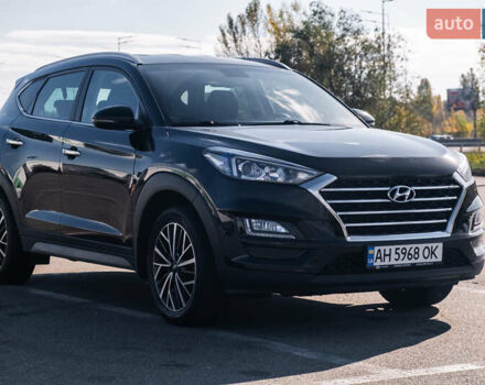 Черный Хендай Туксон, объемом двигателя 2 л и пробегом 88 тыс. км за 23000 $, фото 3 на Automoto.ua